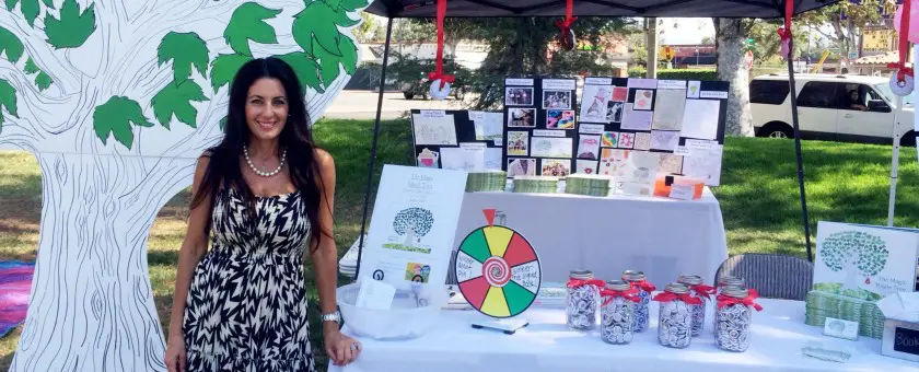 Woman at promotional booth with prizes
